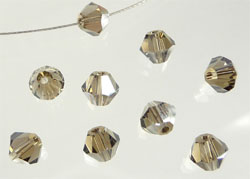 Code: D04804    --- Verre toupie facettes 6mm. Black diamond clair---